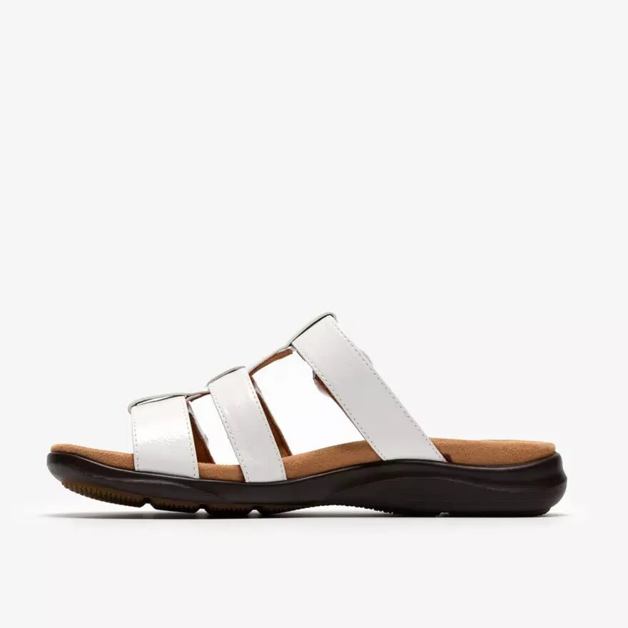 Kitly Pearl witte lakleren platte sandalen voor dames Kitly Pearl witte lakleren platte sandalen voor dames
