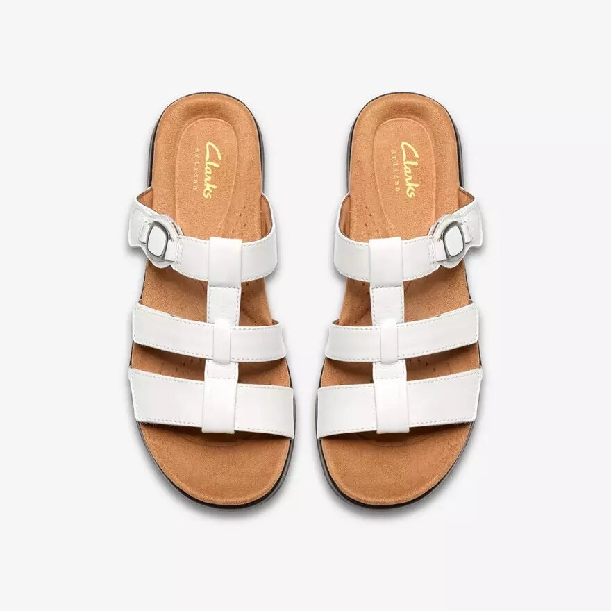 Kitly Pearl witte lakleren platte sandalen voor dames Kitly Pearl witte lakleren platte sandalen voor dames
